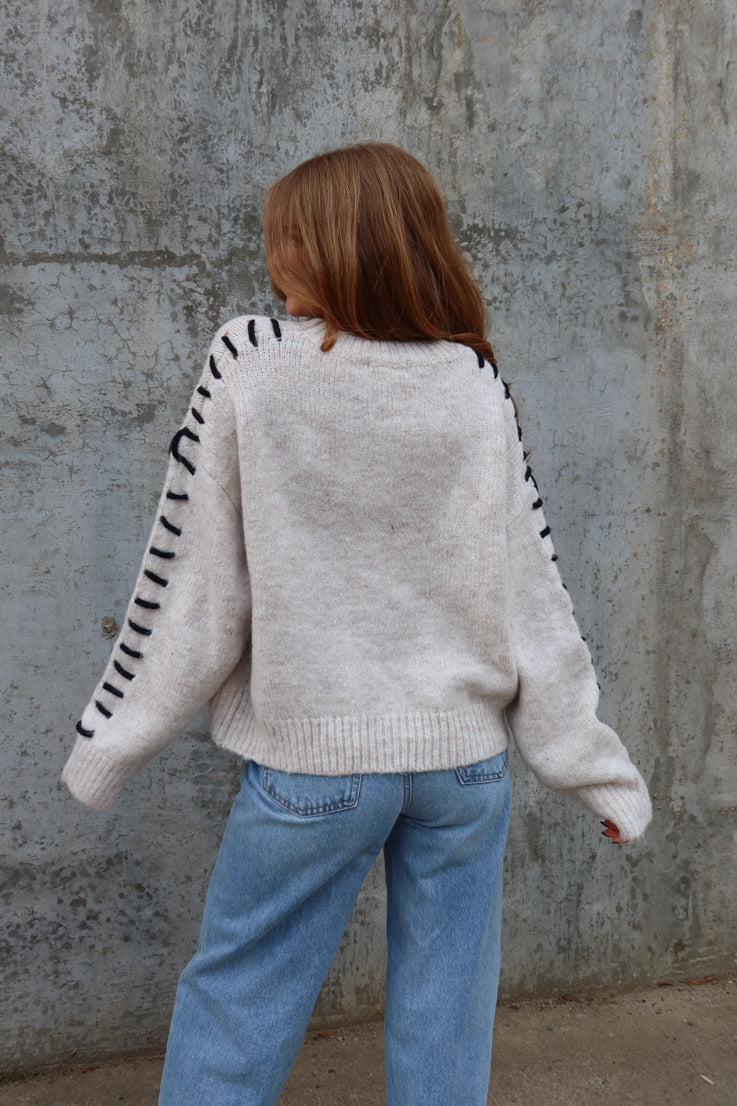 In Stitches Sweater